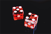 Casino dice. Making an important decision without taking cognitive biases into account is like rolling dice.