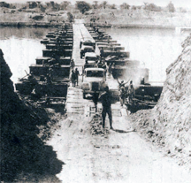 Egyptian forces cross a bridge over the Suez Canal on October 7, 1973, during the Arab-Israeli War