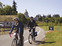 Two cyclists commute to work at the U.S. Federal Highway Administration